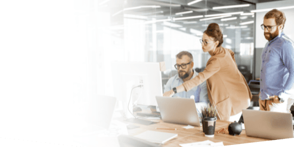 three people working in the office