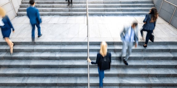 many people walking up stairs